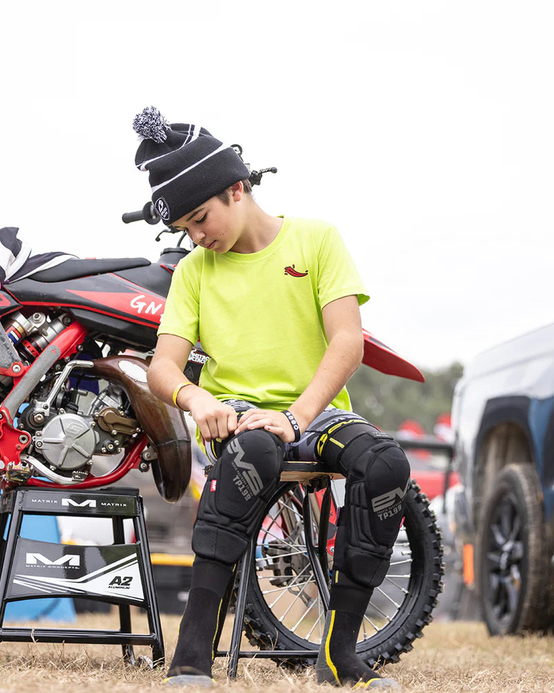 EVS Youth TP199 Blackout Knee Guards Lifestyle 1