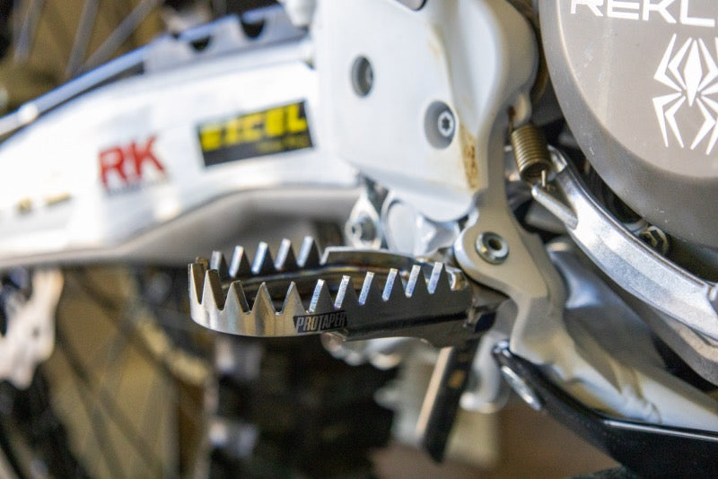 ProTaper Titanium Footpegs Mounted Installed on Dirt Bike. Agressive Traction