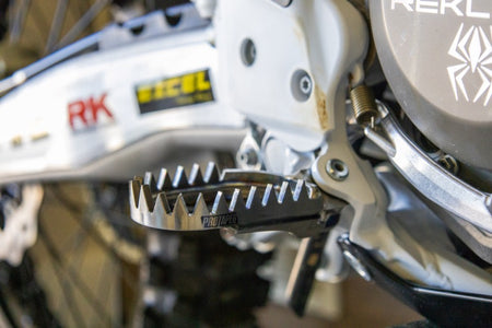 ProTaper Titanium Footpegs Mounted Installed on Dirt Bike. Agressive Traction